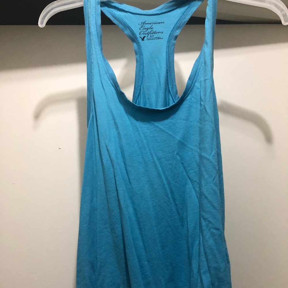 Blue tank top.